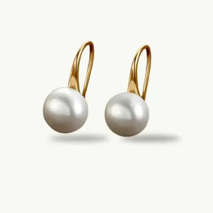 Gold Vermeir Hawaiian Pearl Hook Earrings shop name