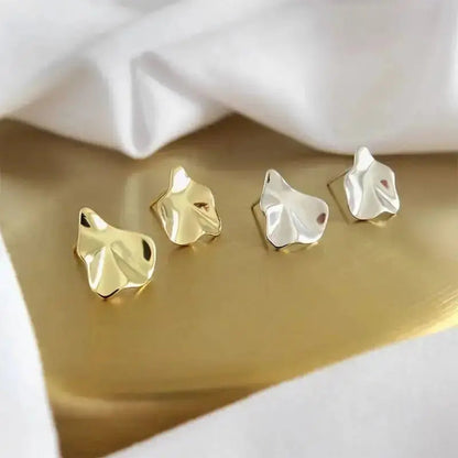 Hammered Surface Shiny Stud Earrings shop name