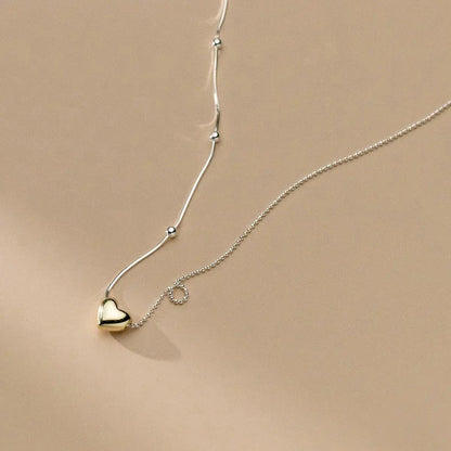 Mixed Metal Gold Heart on Beaded Round Dainty Necklace shop name