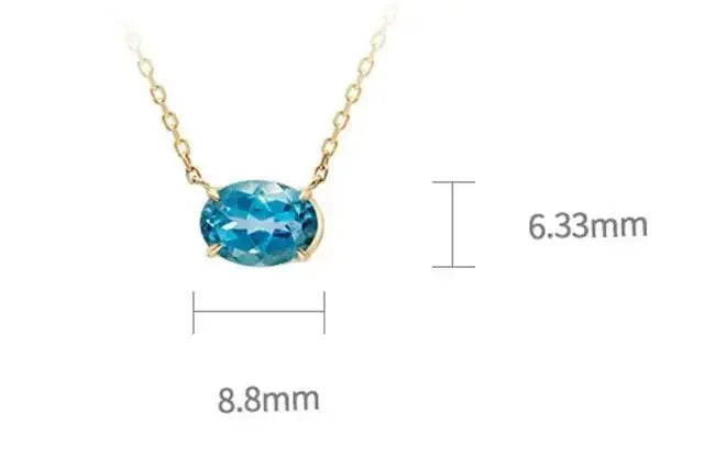 Modern Oval Blue Topaz Necklace in Solid Gold shop name