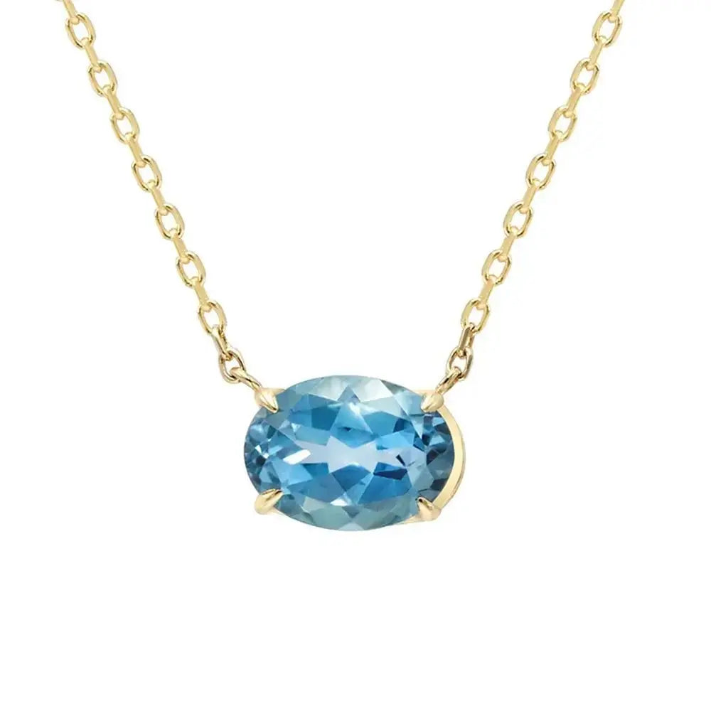 Modern Oval Blue Topaz Necklace in Solid Gold shop name