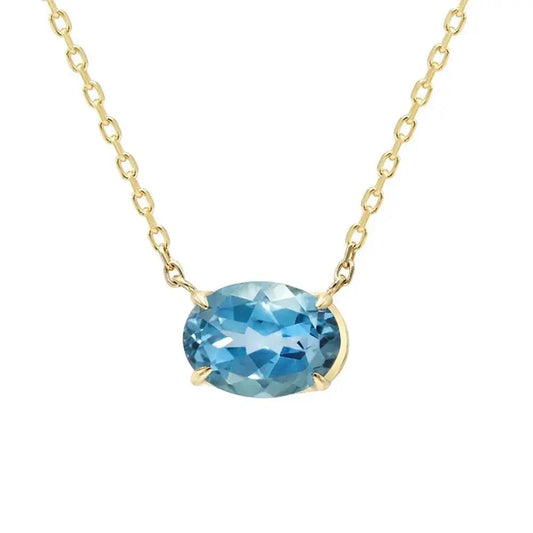 Modern Oval Blue Topaz Necklace in Solid Gold