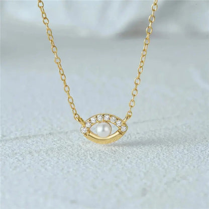 Pearl eye pendant necklaces for women