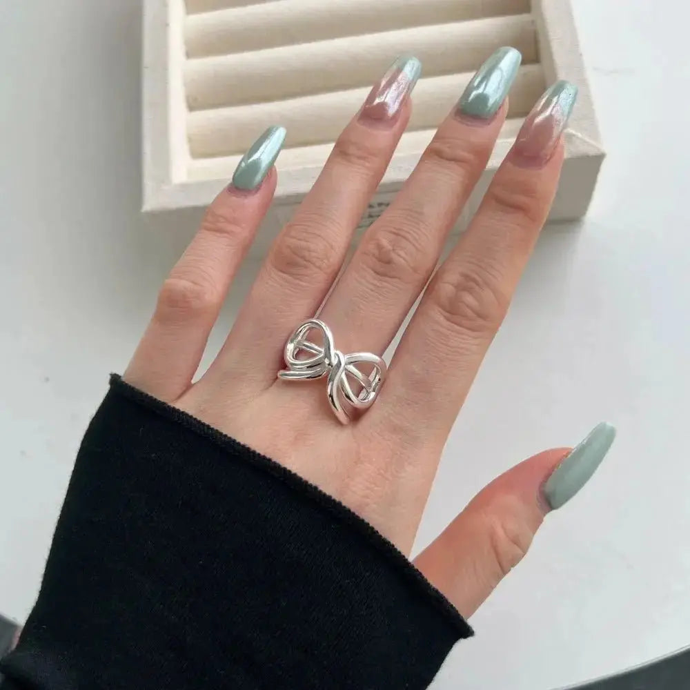 Silver Bow Statement Ring shop name