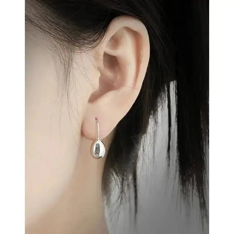 Smooth and Shiny Droplet Sliding Earring shop name