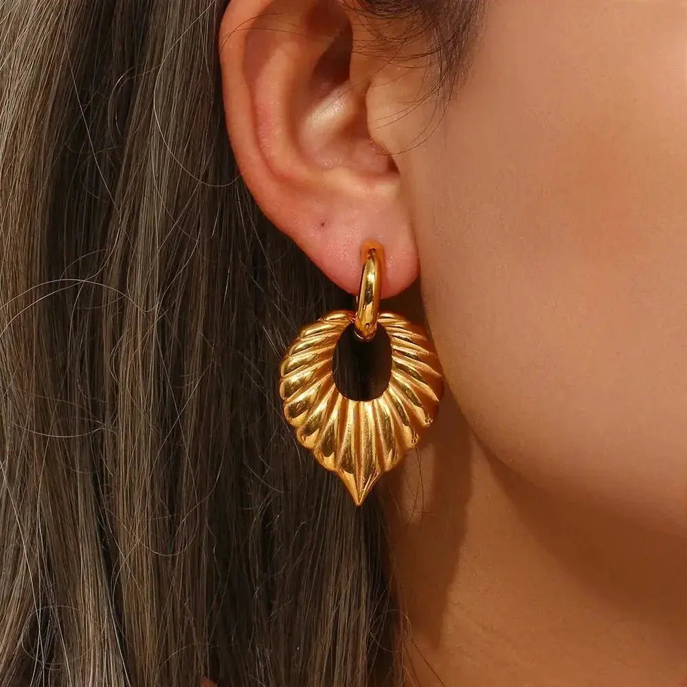 Statement Fashion Leaf Earrings shop name